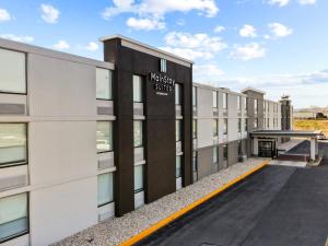 a rendering of the exterior of a building at MainStay Suites Chambersburg in Chambersburg