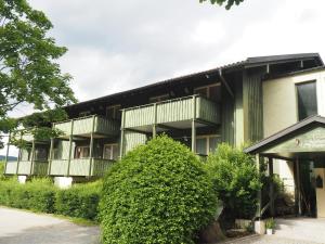 a building with balconies on the side of it at Apartment am Christopherhof in Grafenwiesen