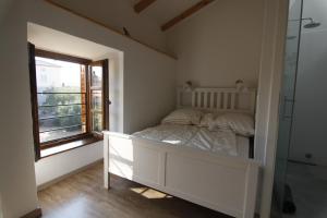 Postel nebo postele na pokoji v ubytování Holiday Home Kuca na Moru