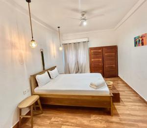 a bedroom with a large bed in a room at Villa Soafeno in Antsiranana