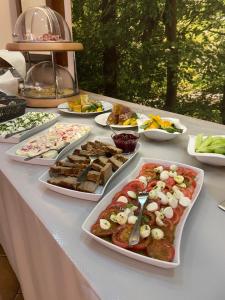 a table with many different types of food on it at Trojak Mysłowice in Mysłowice