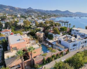 an aerial view of a city with a harbor at Sezz Hotels Spa Wellness Yalikavak Adult Only in Yalıkavak