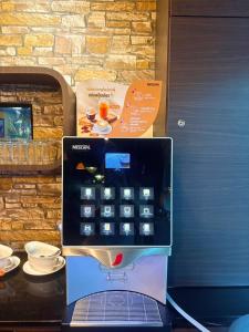 a display of an apple tablet computer in a store at Sweetloft Hotel Don Muang in Bangkok +23 photos