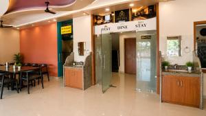 a restaurant with a table and a sign that reads just dance stay at Jhankor Hotel in Sīkar +16 photos