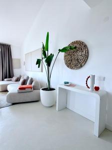 a living room with a couch and a table at Seaside Luxury Apartment - Lozenetz in Lozenets
