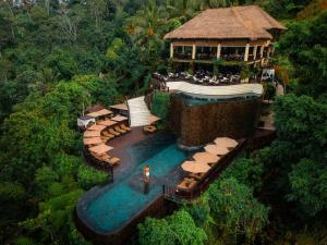 an aerial view of a resort with a swimming pool at Hanging Gardens of Bali in Payangan