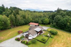an aerial view of a house in the middle of a field at Gemütliches 3-Sterne Ferienhaus in Zwiesel