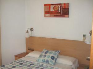 Llit o llits en una habitació de Hostal Felipe 2