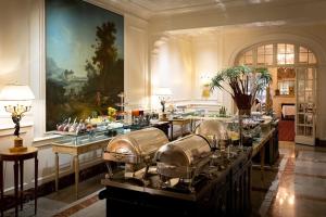 a large kitchen with several pots and pans at Grand Hotel Sitea in Turin