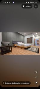 a living room with a bed and a couch at Hotel Royal EdelWeiss in Leh