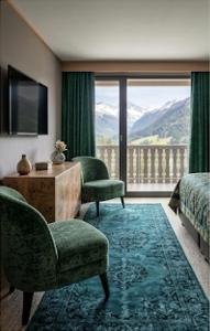 a hotel room with a view of a mountain at Le Cocon des 2 Alpes, Spa, Jacuzzi, Piscine Chauffee in Les Deux Alpes