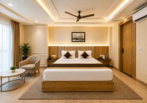 a hotel room with a bed and a chair at Hotel The Venue At Delhi Airport IGI in New Delhi +41 photos
