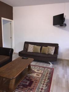 TV a/nebo společenská místnost v ubytování Appartements Bon Secours