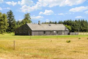an old barn sitting in a field in a field at 1388-Snedsted-Kaergardsvej-30 in Nørhå