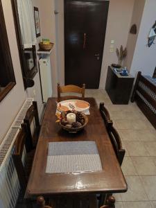a dining room table with a bowl of food on it at Villa near Ierissos in Ierissos +43 photos