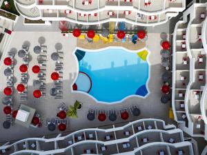 an overhead view of a city with a swimming pool at Sholeo Lodges Los Gigantes in Puerto de Santiago +126 photos