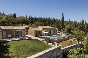 an aerial view of a house with a swimming pool at Villa Thalassa by Villa Select in Fiskardo