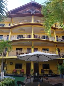 a view of the hotel from the courtyard at Phratamnak Inn Hotel & Guesthouse - 100 mtr from the beach in Pattaya South