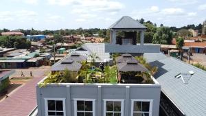an overhead view of a building with a tower on top at Saffron Inn Luxury Hotel in Marsabit