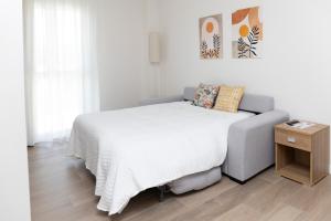 Llit o llits en una habitació de Hotel Bidea