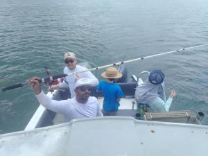 a group of people on a boat in the water at Tour Full Day Taboga in Panama City