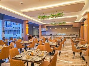 an image of a restaurant with tables and chairs at Sebai Laxury Suit in Nairobi