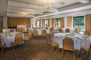a conference room with tables and chairs and tablesktop at St. Pierre Park Hotel & Golf in St. Peter Port