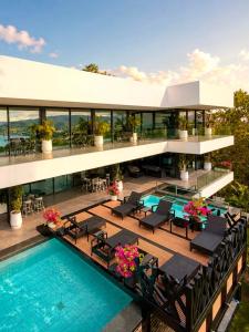 an aerial view of a building with a swimming pool at Villa Veha, Koh Samui Resort & Free Spa, Fitness, Massage room, Espace game in Koh Samui