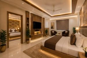 a hotel room with a bed and a television at The Runway Corporate Hotel IGI Delhi Airport Terminal-3 With Free Airport Pickup in New Delhi