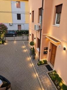 a courtyard of a building with lights on it at Da Leo & Mia in Modena