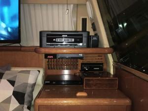 a room with a dvd player and a television at The Duke Superyacht - LINDIAN in Lindos +10 photos