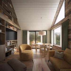 a living room with a table and chairs at The Greenhouse Hotel in Hveragerði