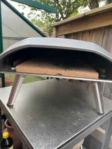 a grill with two pans on top of a table at Skiftehuset in Ytterby