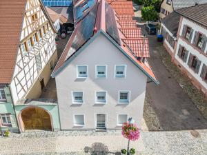 an aerial view of a white house with a red roof at Apartment Laura - S7 by Interhome in Endingen