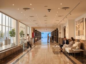 a rendering of the lobby of a building at TIME Marina North Coast in El Alamein +108 photos
