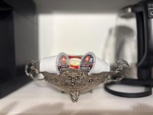 a silver bird holder on top of a counter at Wasaga Dunes in Wasaga Beach