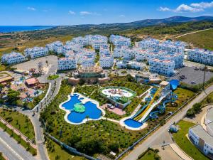 an aerial view of a resort with a water park at L'escale Appart-hôtel By 7AV HOTELS in M'diq