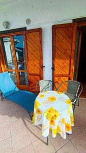 a table and chairs sitting on a patio at Da Ross in Castel di Sangro