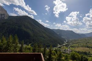 a view of a valley with trees and mountains at Luxury Lodges by Grand Hotel Sitea in Sestriere