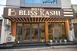 a hotel with a sign that reads bliss khash ash at Hotel Bliss Kashi in Kakarmatha