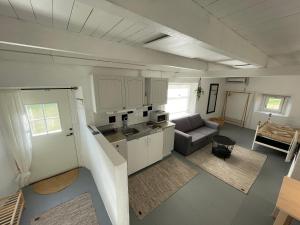 an overhead view of a kitchen and a living room at Galleriet BnB in Stenkyrka