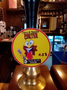 a sign on top of a counter in a restaurant at lyndon house hotel in Walsall