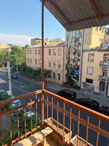 a balcony with a view of a city street at best hotel yerevan in Yerevan