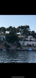 a view of a body of water with boats in it at La casa al mare in Palermo