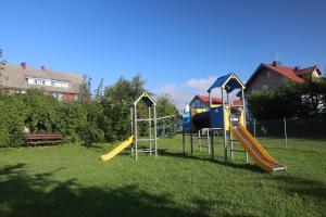a park with a playground with a slide at DW Viva in Rewal