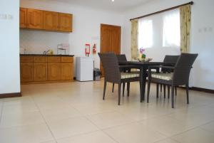 Kuchyň nebo kuchyňský kout v ubytování Marie Laure Suites