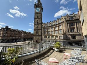 a view of a building with a clock tower at Tolbooth Apartments by Principal Apartments in Glasgow