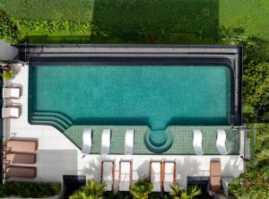 an overhead view of a rv with a swimming pool at Hotel LaVue Tam Coc in Ninh Binh