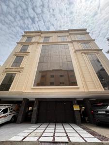 a building with a car parked in front of it at أوريانا Oriana in Jeddah