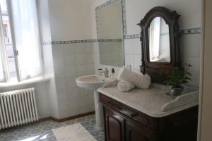 a bathroom with a sink and a mirror at Villa Marina Como Boutique B&B & Apartments in Como +29 photos